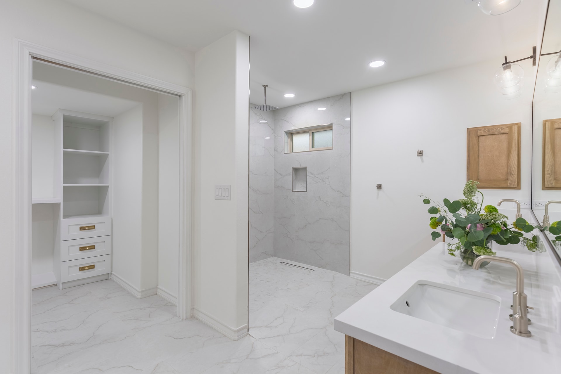 Modern marble bathroom with walk-in shower