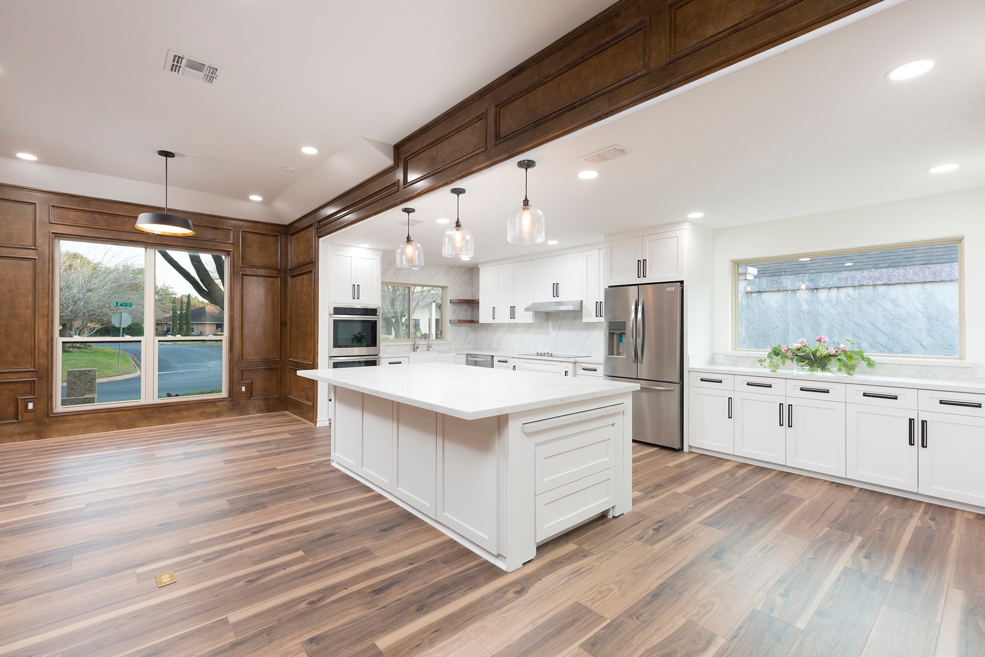 Modern kitchen with white cabinets and island