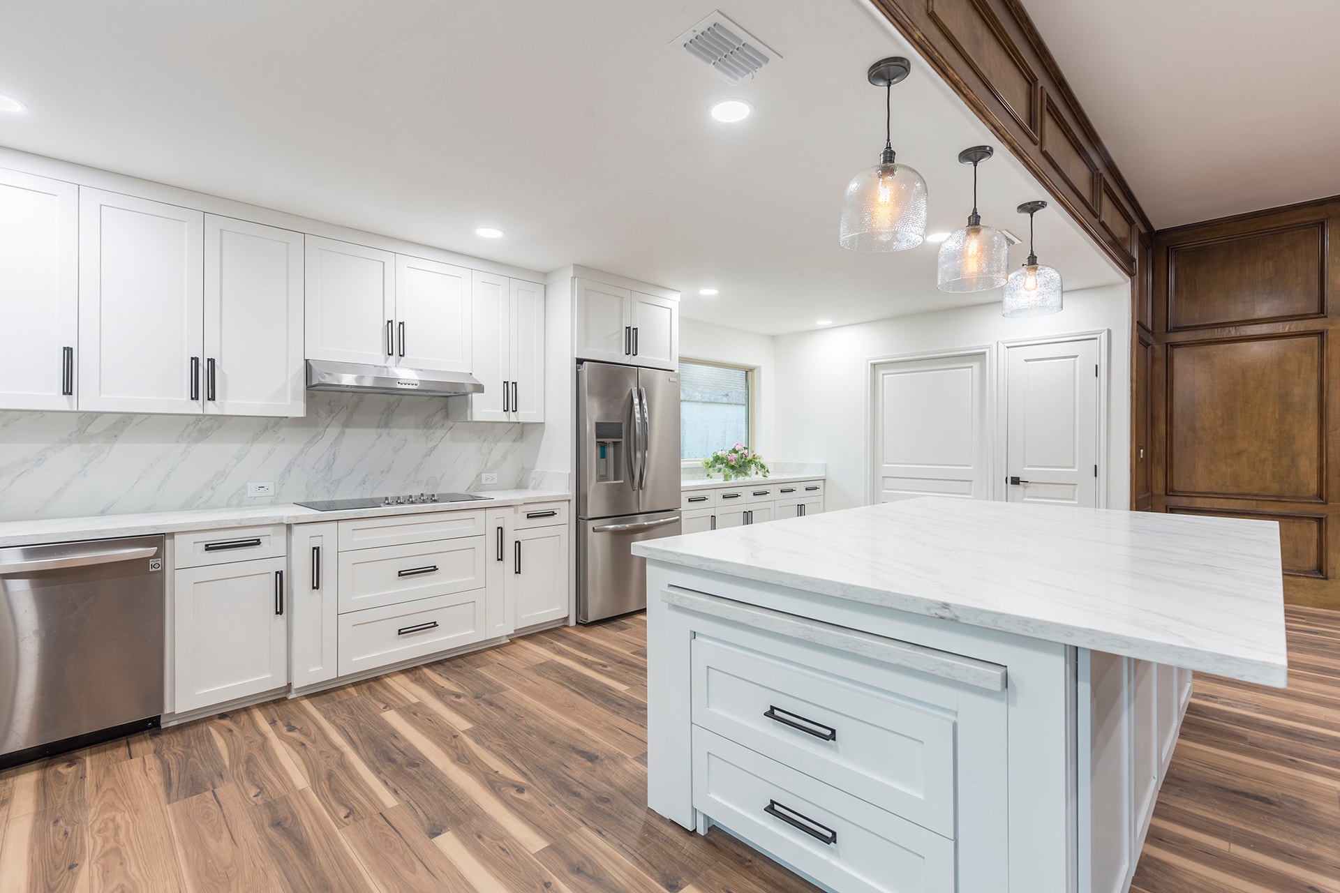 Modern kitchen white cabinets marble island