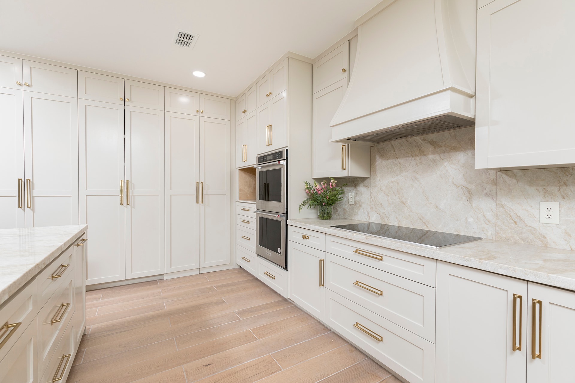 Modern white kitchen marble countertops stainless appliances