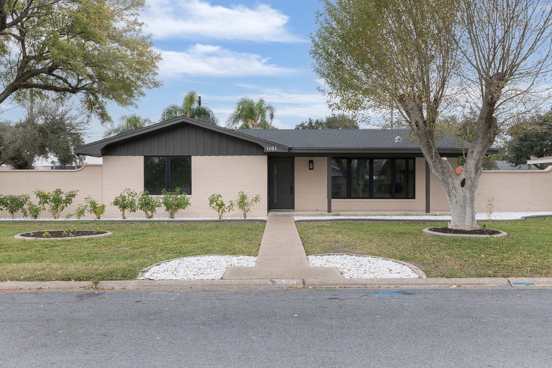 Modern mid-century home with landscaped front yard