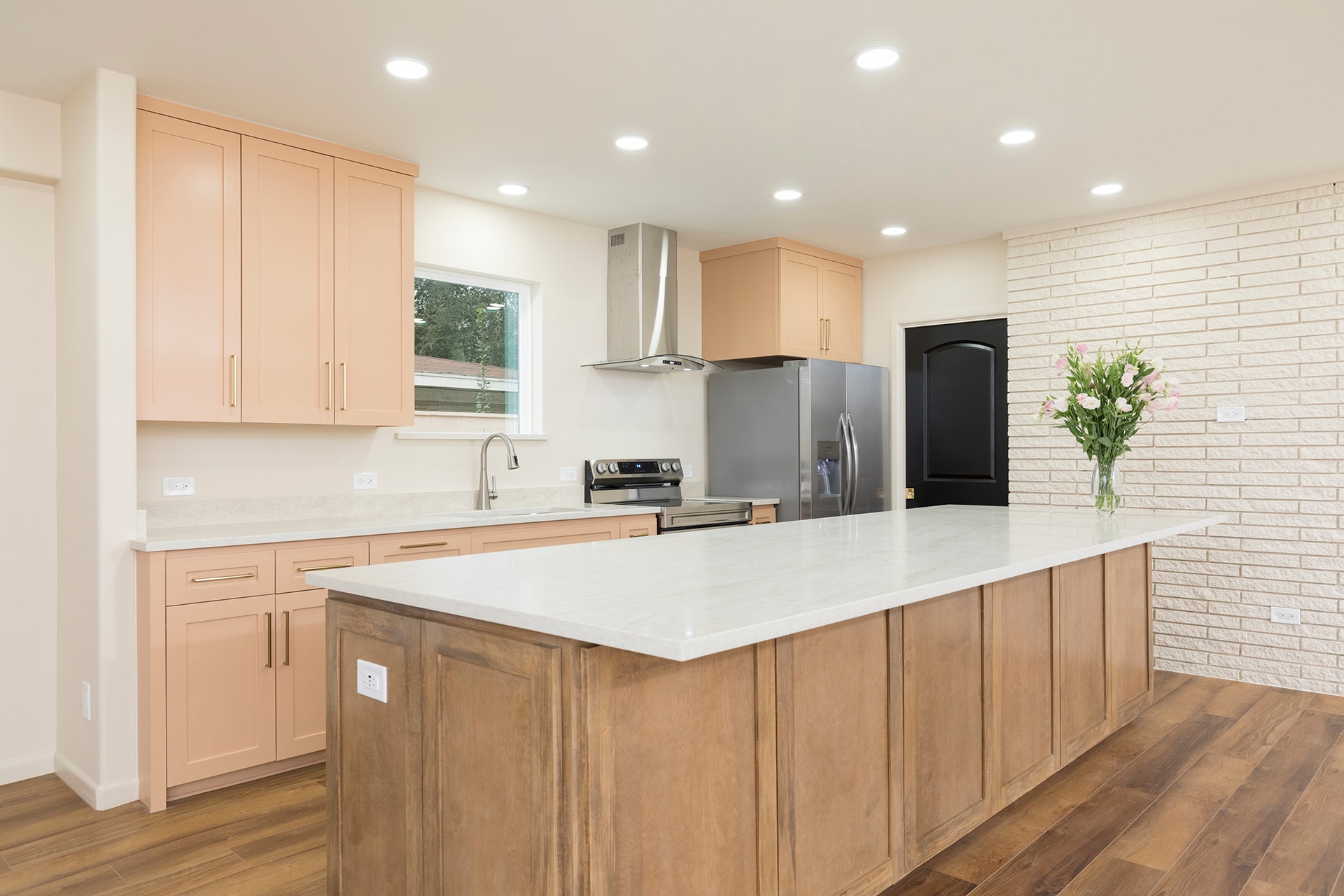 Modern kitchen with wood cabinets island