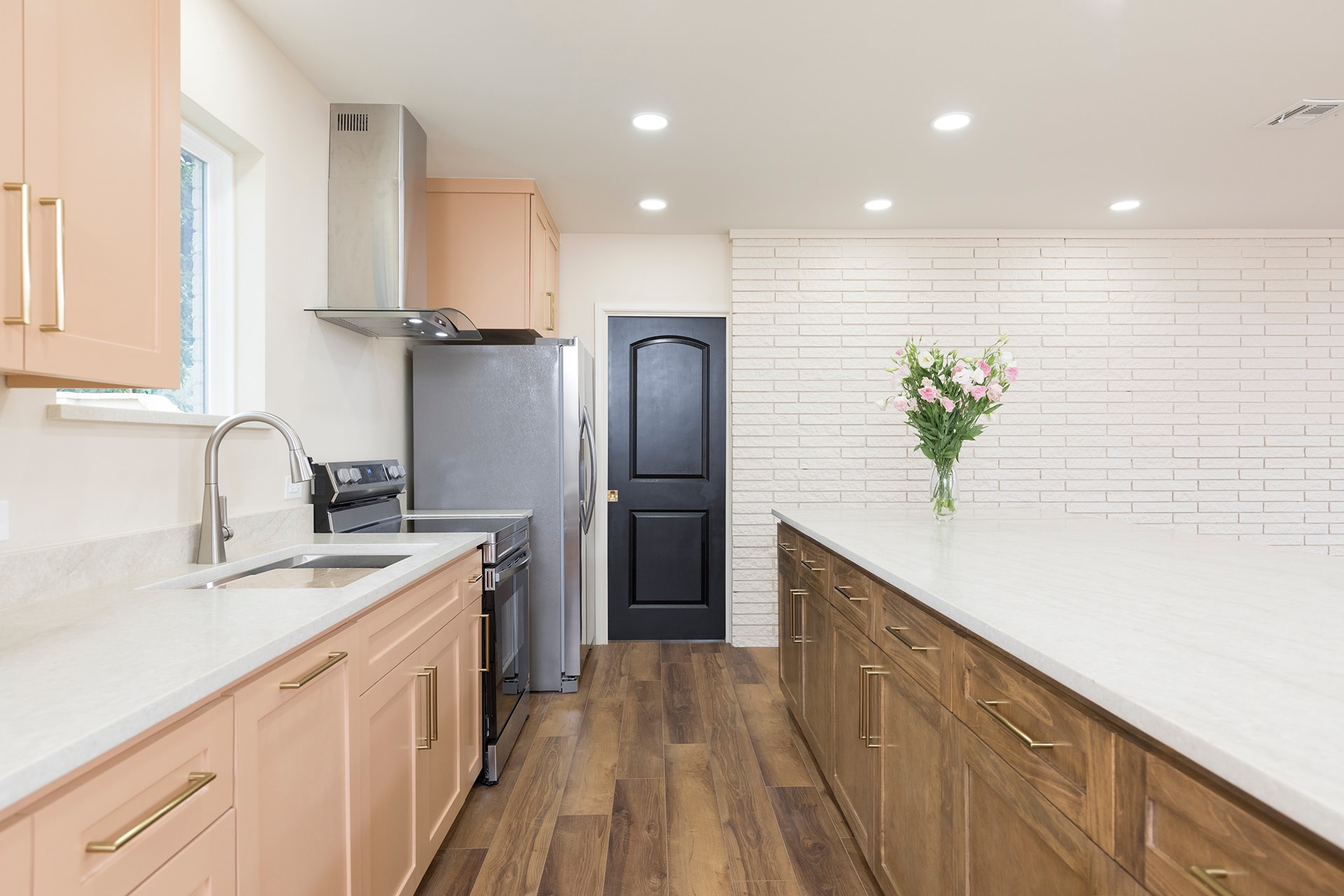 Modern kitchen with wood cabinets white subway tile