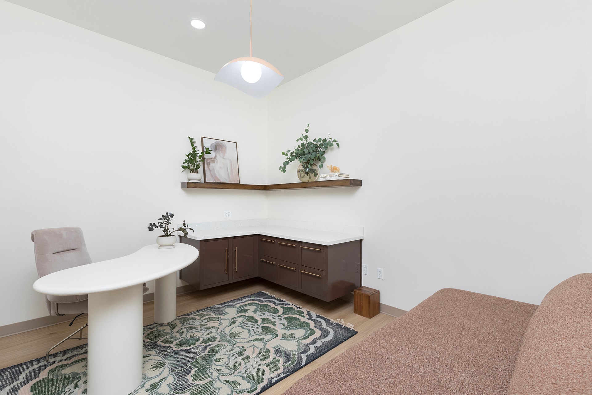 Modern office space with plants and furniture