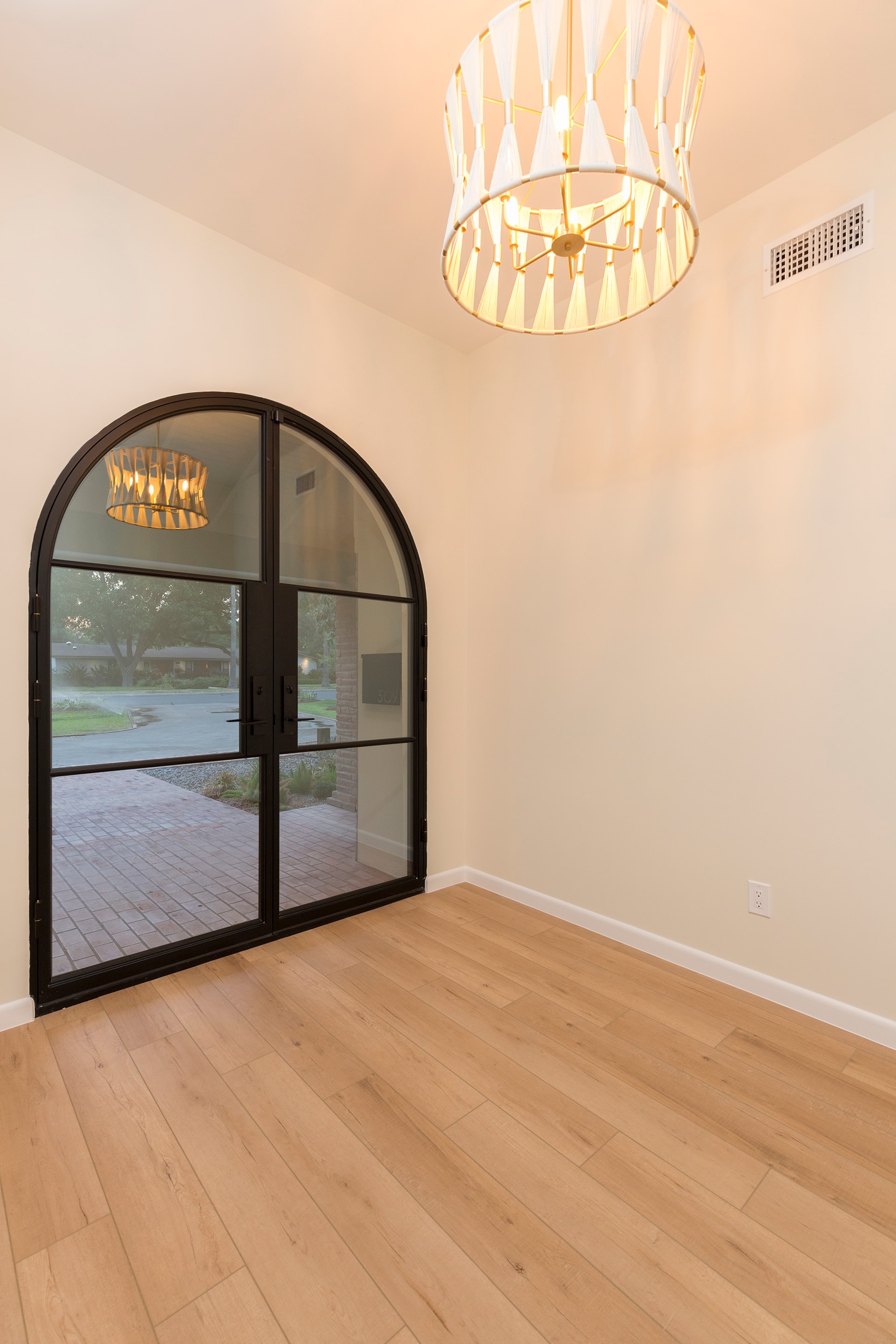 Modern interior arched doors wood flooring