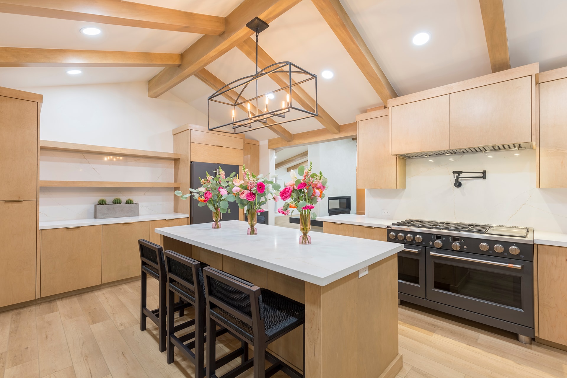 Modern kitchen with wood beams and flowers