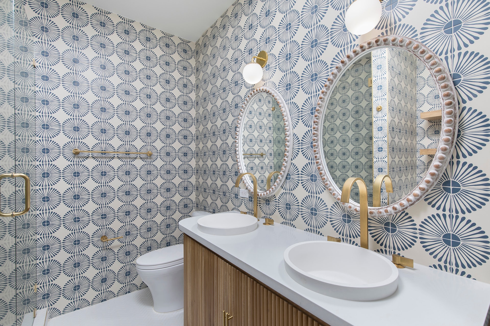 Modern bathroom with patterned wallpaper