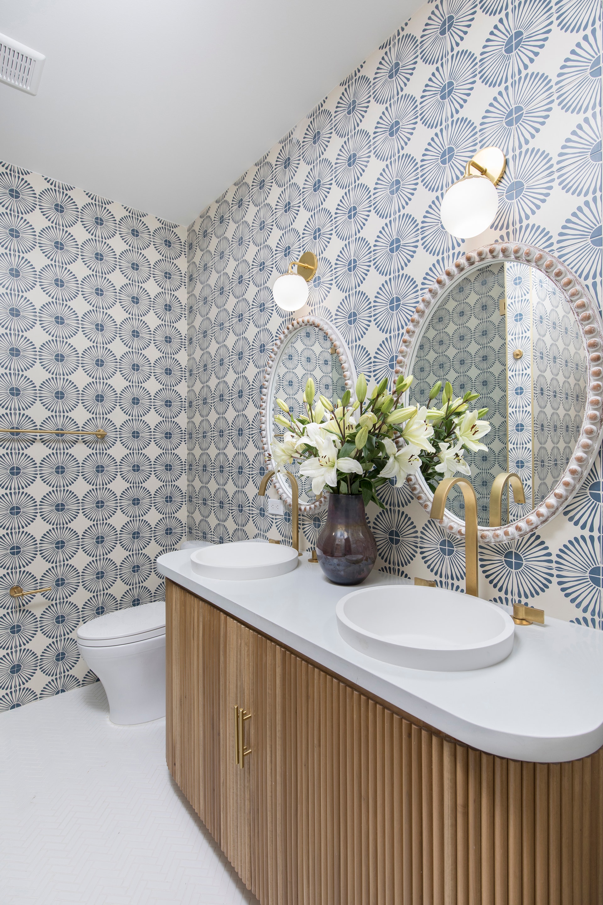 Modern bathroom with patterned wallpaper