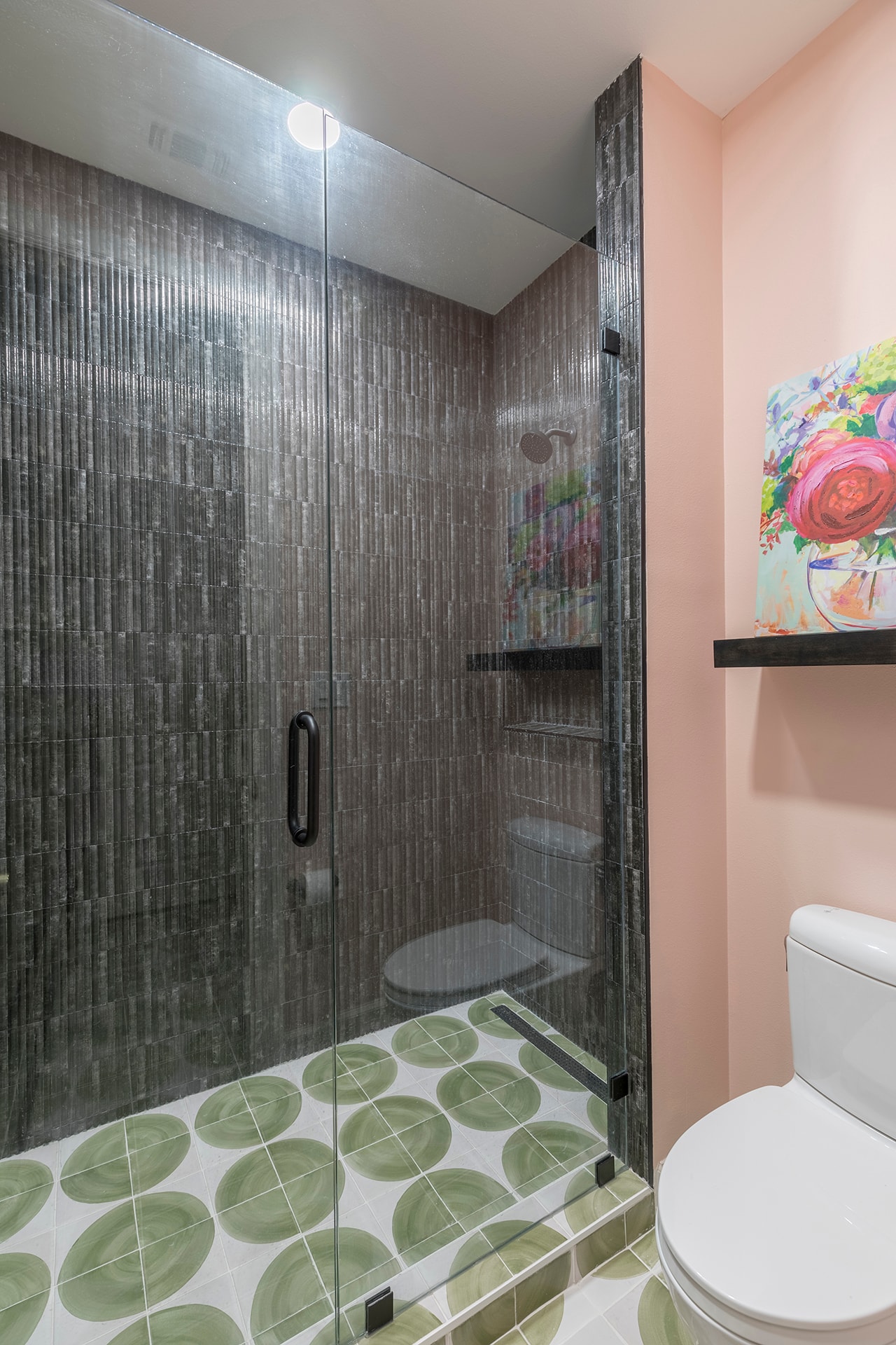 Modern bathroom shower with pink walls